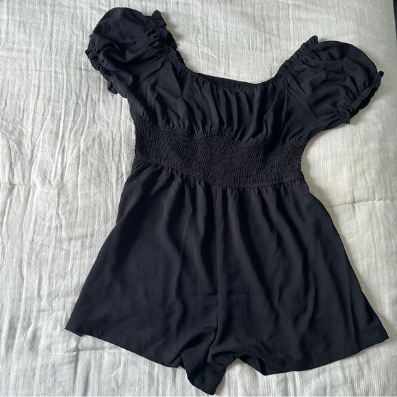 SOLD: Black Smocked Romper - Picture 2 of 3